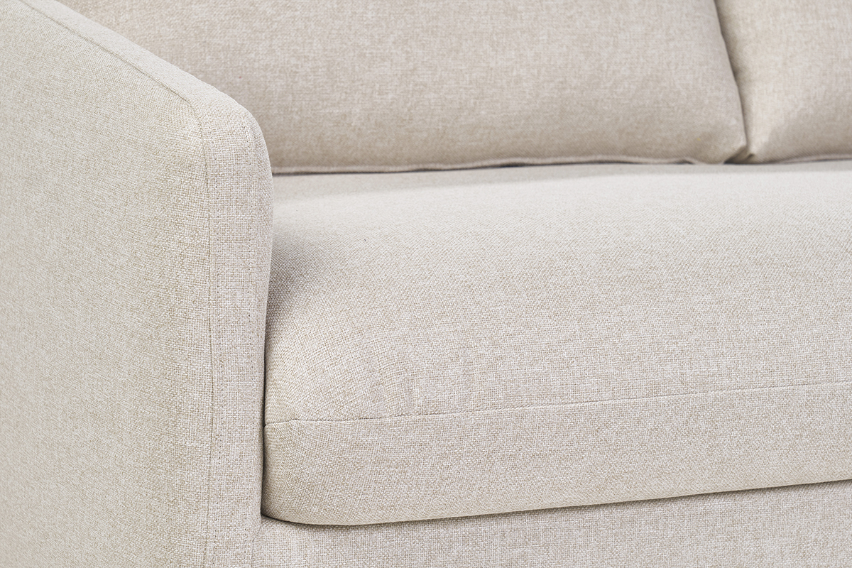 Canap� convertible beige cr�me, vue de pr�s, montrant l'accoudoir et le tissu.
