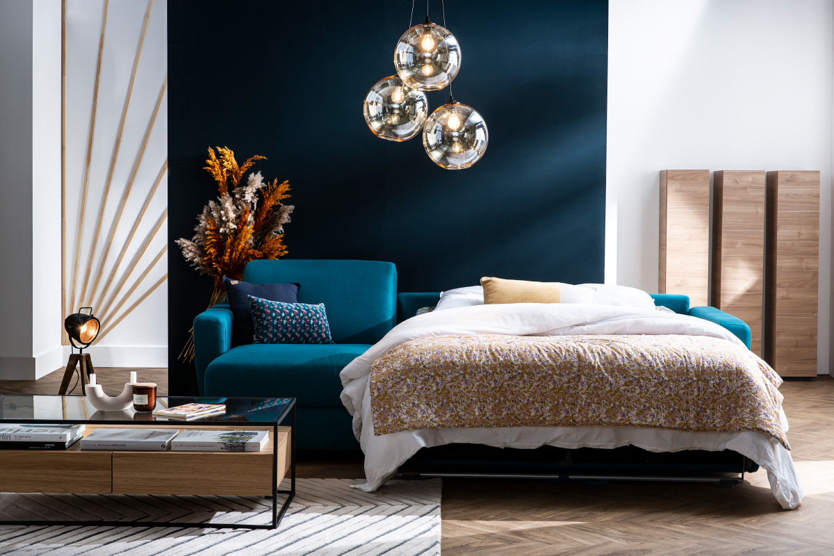 Canap� d'angle convertible r�versible avec coffre 4 places en tissu bleu canard et bois clair GRAHAM