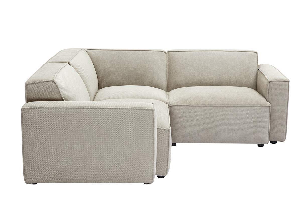 Canap� d'angle modulable 3 places en tissu effet velours beige, vue de c�t�.
