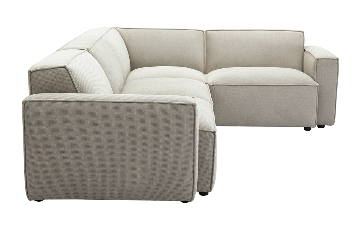 Canap� d'angle modulable beige en tissu effet velours textur�, 5 places.