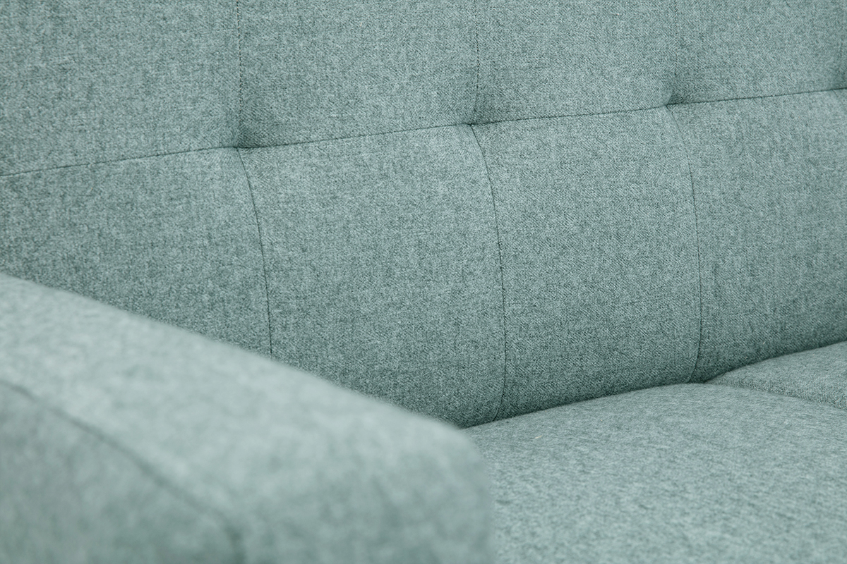 D�tail du tissu vert de gris et dossier capitonn� du canap� scandinave MOON.