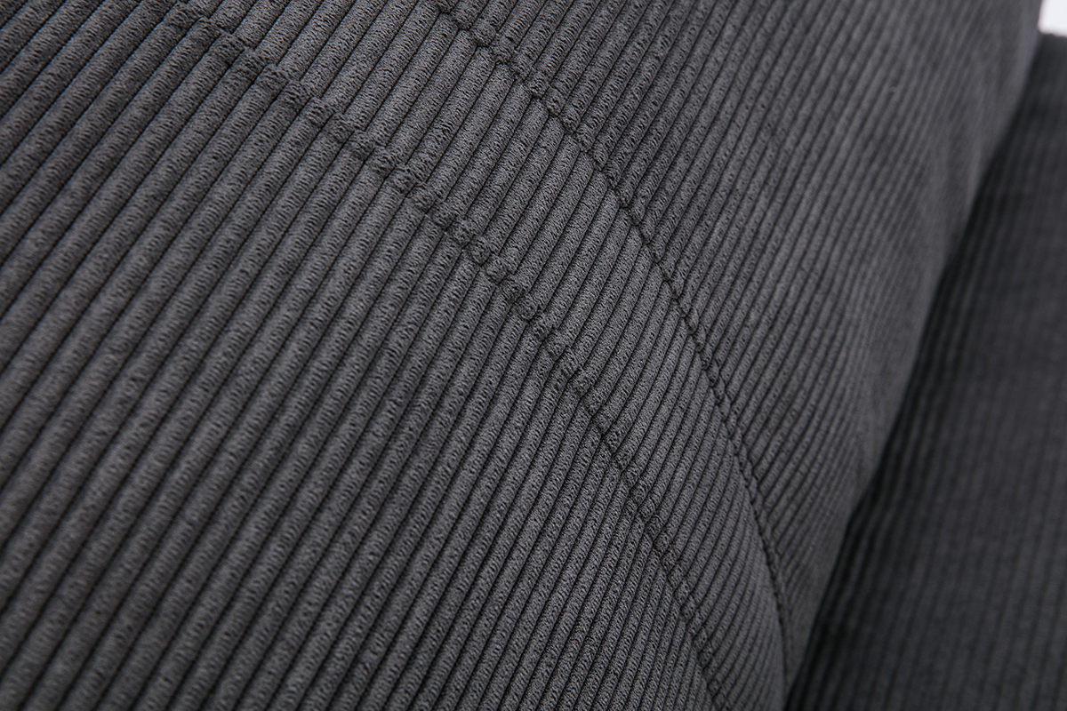 D�tail du tissu velours c�tel� gris fonc� de la chauffeuse SPENCER