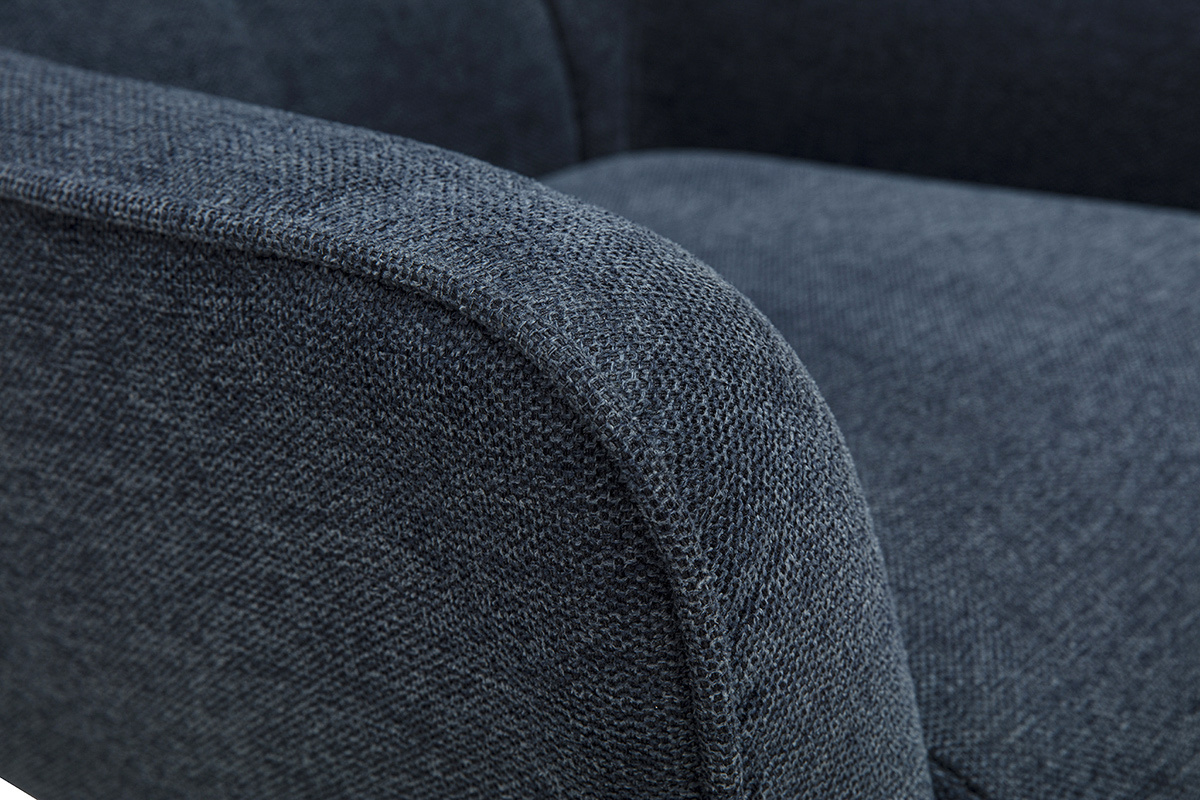 D�tail du tissu effet velours textur� bleu fonc� du fauteuil scandinave pivotant.