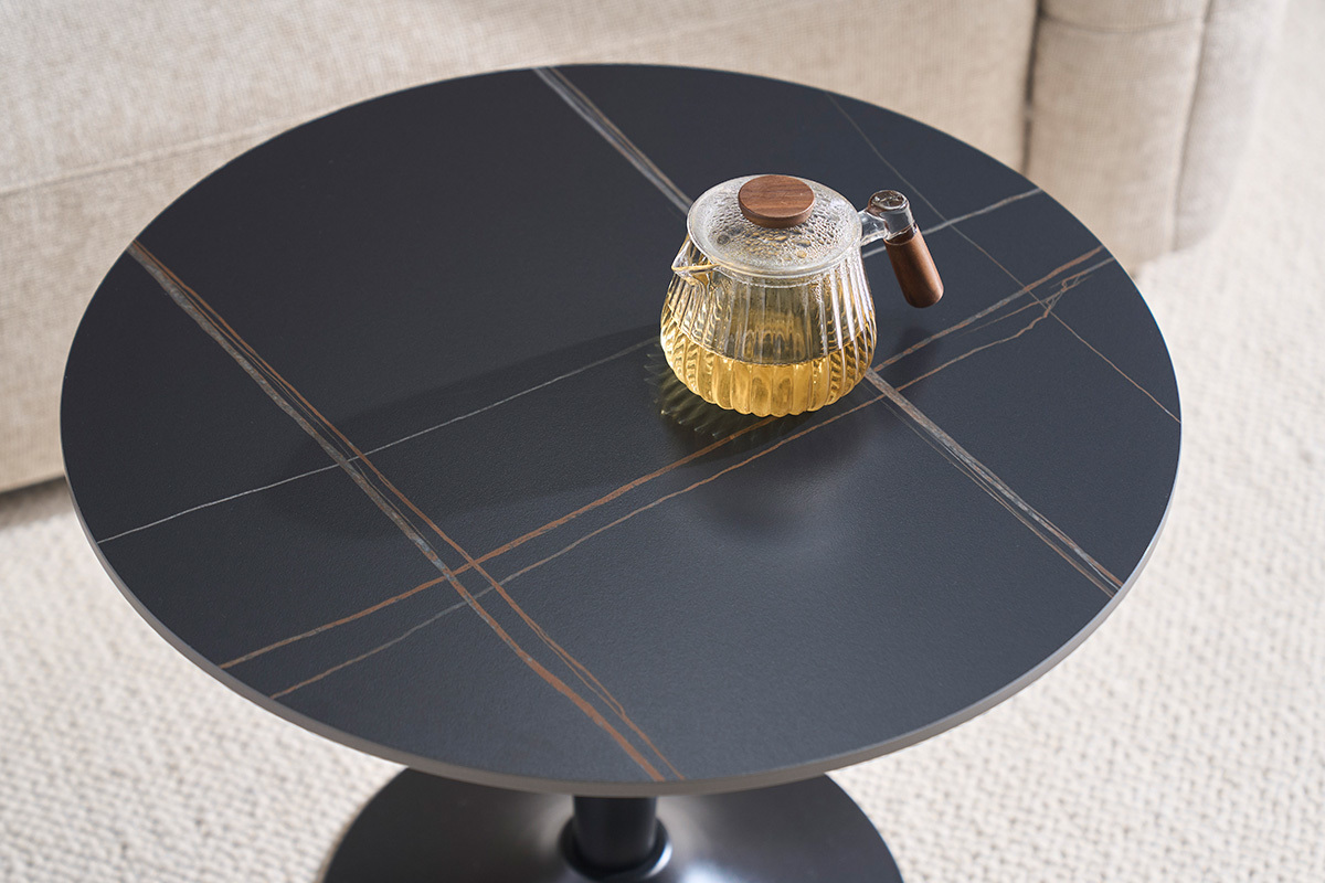 Table basse design ronde en c�ramique noire et m�tal D60 cm MALOU