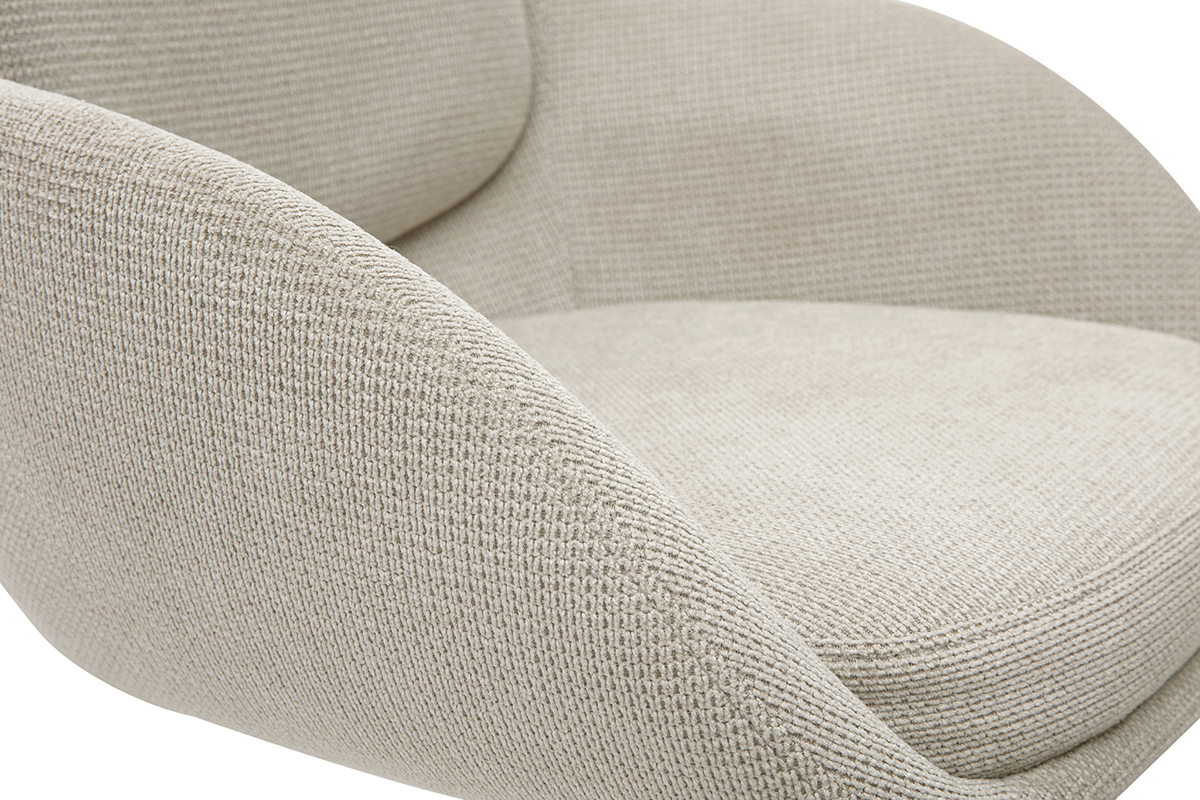 D�tail de l'assise d'un tabouret de bar r�glable beige en tissu effet velours textur�.